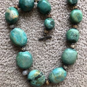 Turquoise beaded necklace.